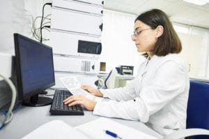 Researcher analyzing risk for peritoneal mesothelioma